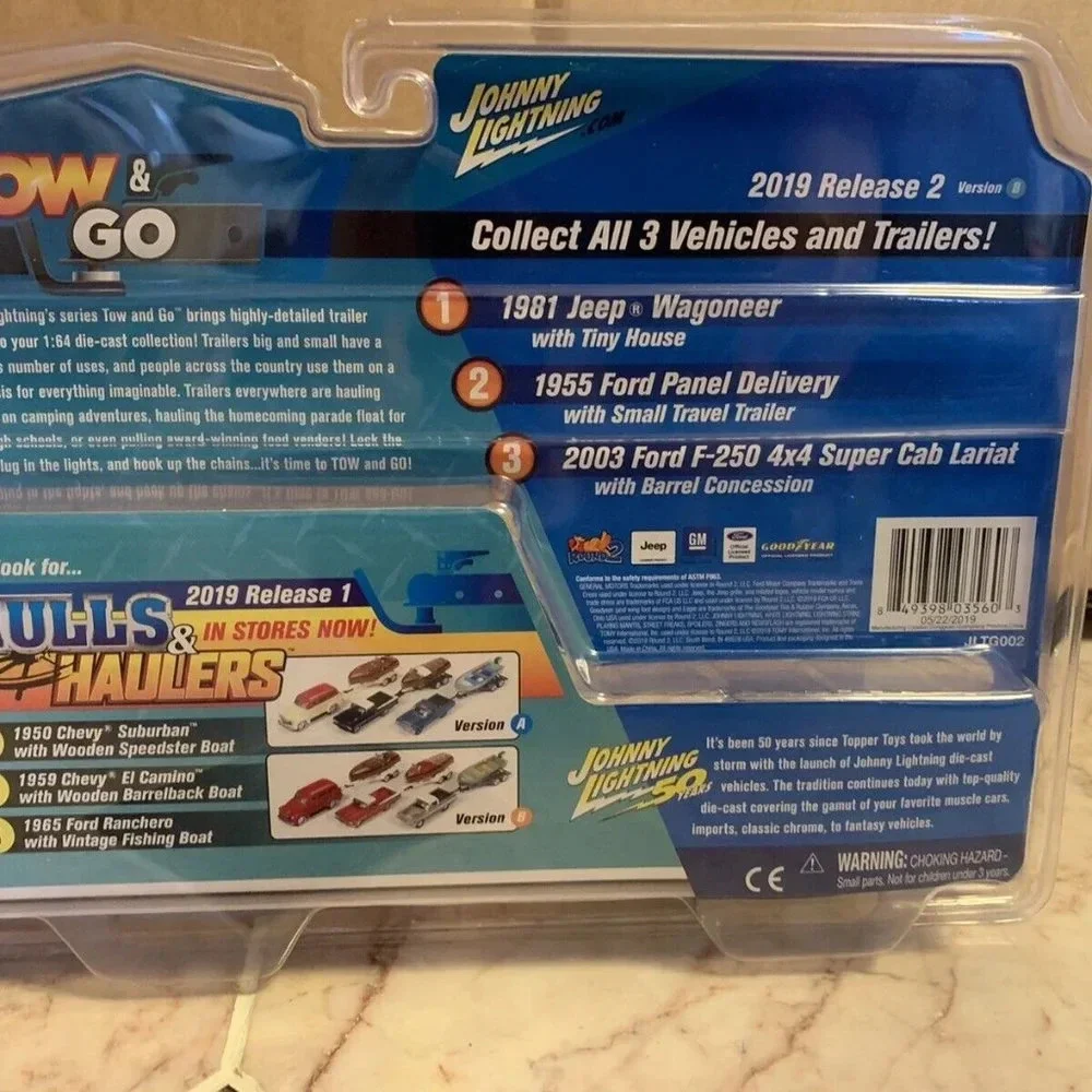 Johnny Lightnings Tow & Go 2003 Ford F-250 + Barrel Concessions Limited 1/4000